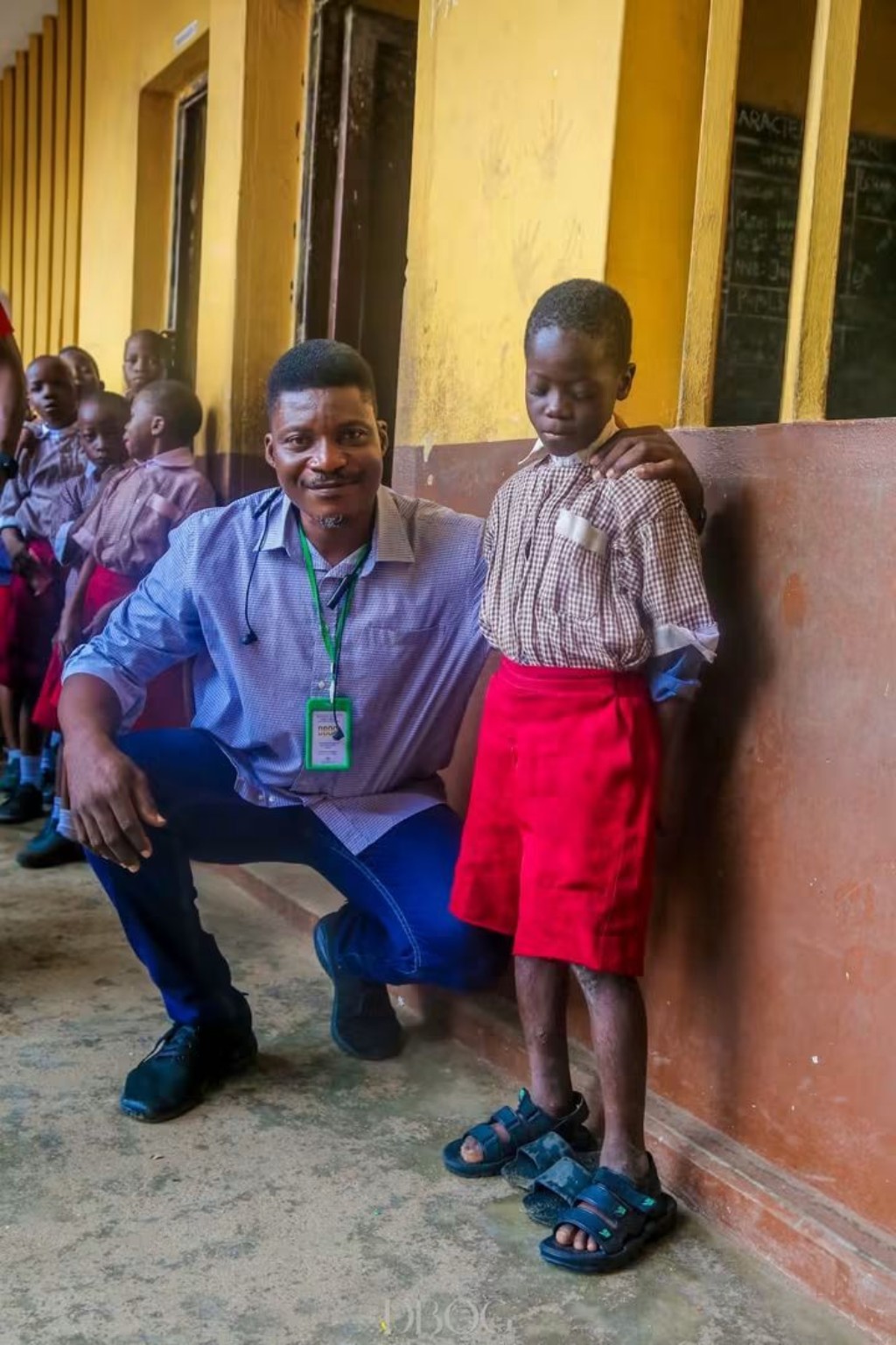 DBOG representative with a child