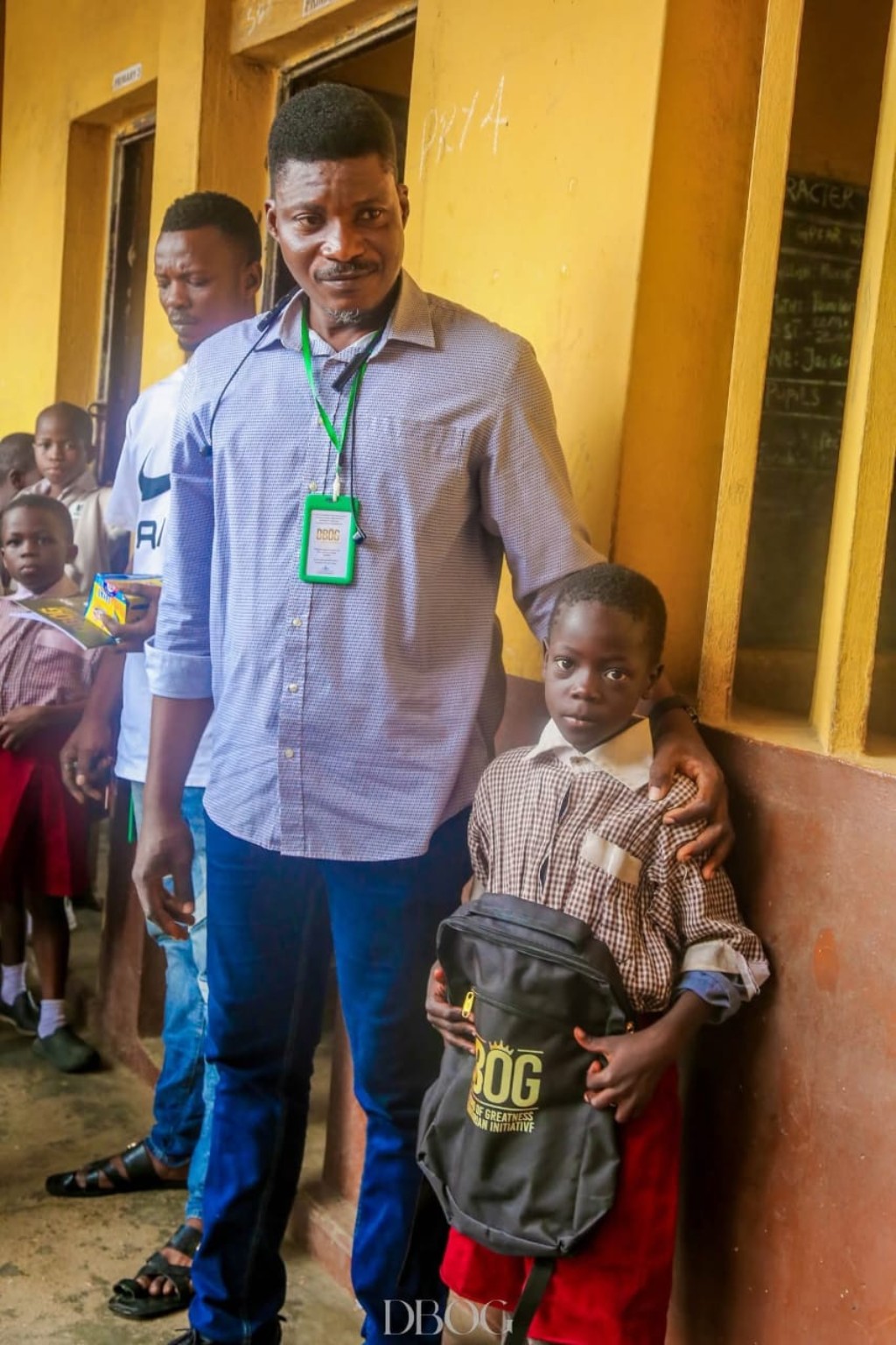 DBOG representative with a child