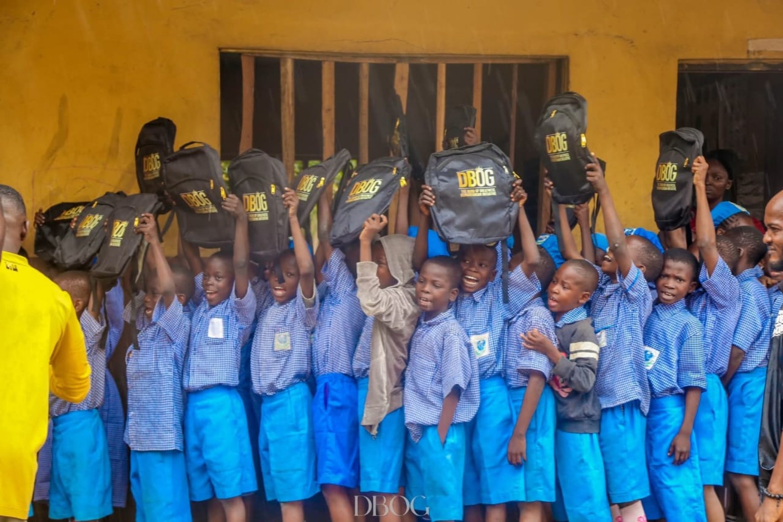 DBOG team with children during a community outreach